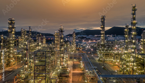 Oil and gas refinery plant form industry zone at night  Aerial view oil and gas Industrial petrochemical fuel power and energy.
