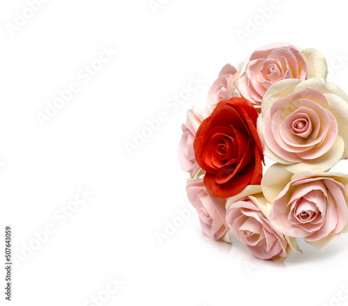 A bunch of bunches of roses laid out on a white background.