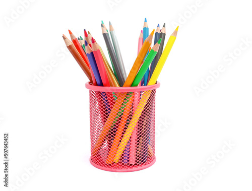 Colored pencils in red pencil box isolated on white background.