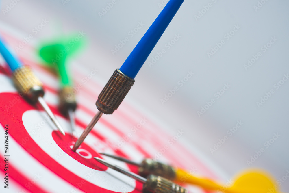 dartboard with arrow. creative concept idea for success with focus point on target to the winner in business with strategy management aim to leadership. dartboard with arrow. creative concept idea for success with focus point on target to the winner in business with strategy management aim to leadership.