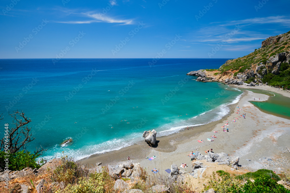 View of Preveli beach on Crete island with relaxing people and Mediterranean sea. Crete island, Greece