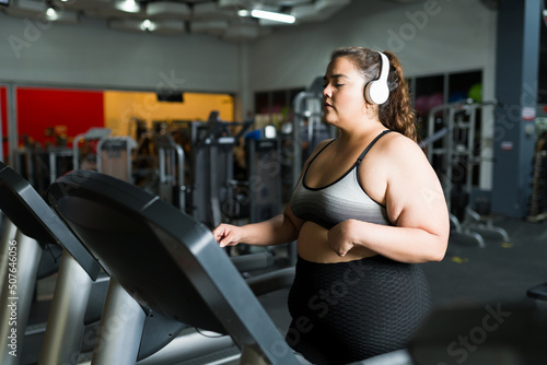Determined woman exercising to lose weight
