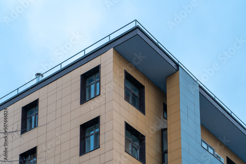 Billede på lærred Close up view of corner of modern apartment building with balcony