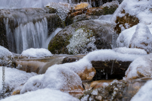 stream in the forest during winter (Tyrol, Austria)
