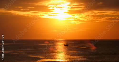 Ocean sunset with boats in sea. Mumbai  India