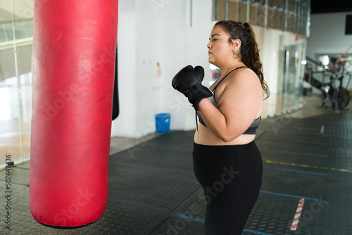 Big young woman ready to start boxing © AntonioDiaz