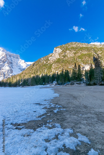 Fototapeta Naklejka Na Ścianę i Meble -  frozen Lago di Braies and its mountain scenery (Dolomites, Italy)
