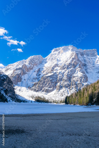 frozen Lago di Braies and its mountain scenery (Dolomites, Italy)