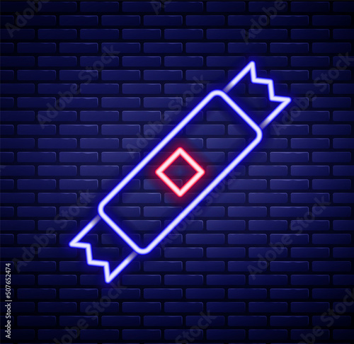 Glowing neon line Sugar stick packets icon isolated on brick wall background. Blank individual package for bulk food products as coffee, salt, spices. Colorful outline concept. Vector