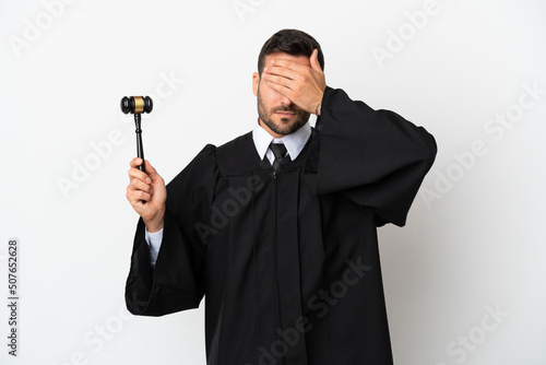 Judge caucasian man isolated on white background covering eyes by hands. Do not want to see something