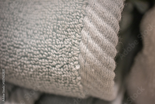 Clean towels arranged in home laundry room - Macro concept