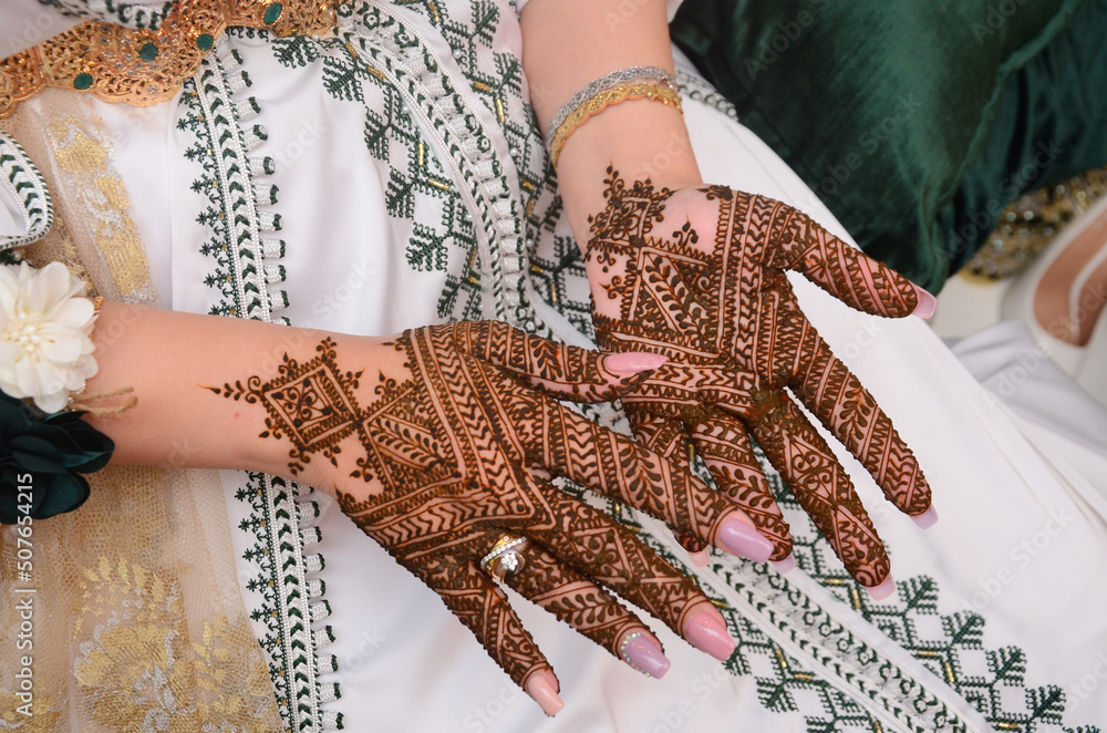 Henna Tattoo on Bride's Hand.Moroccan wedding preparation henna party. Temperate white Modern mehendi art... Stock Photo | Adobe