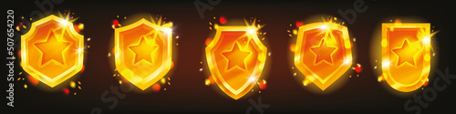 Golden game badge vector set, award UI medal shield kit, shiny rank reward, level up achievement. Rating bonus star, winner champion coin, interface tournament design element. Game badge leader assets