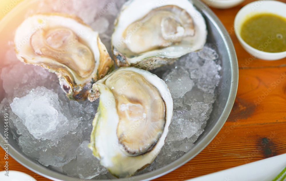 oysters in plate serve with seafood dipping oysters in plate serve with seafood dipping