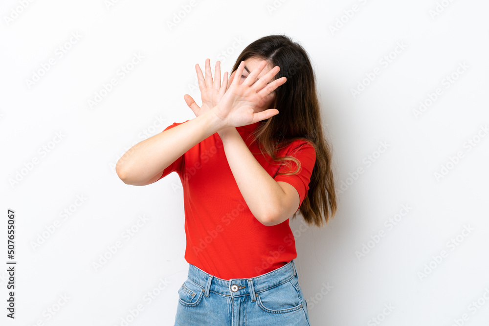 Young caucasian woman isolated on white background nervous stretching hands to the front Young caucasian woman isolated on white background nervous stretching hands to the front