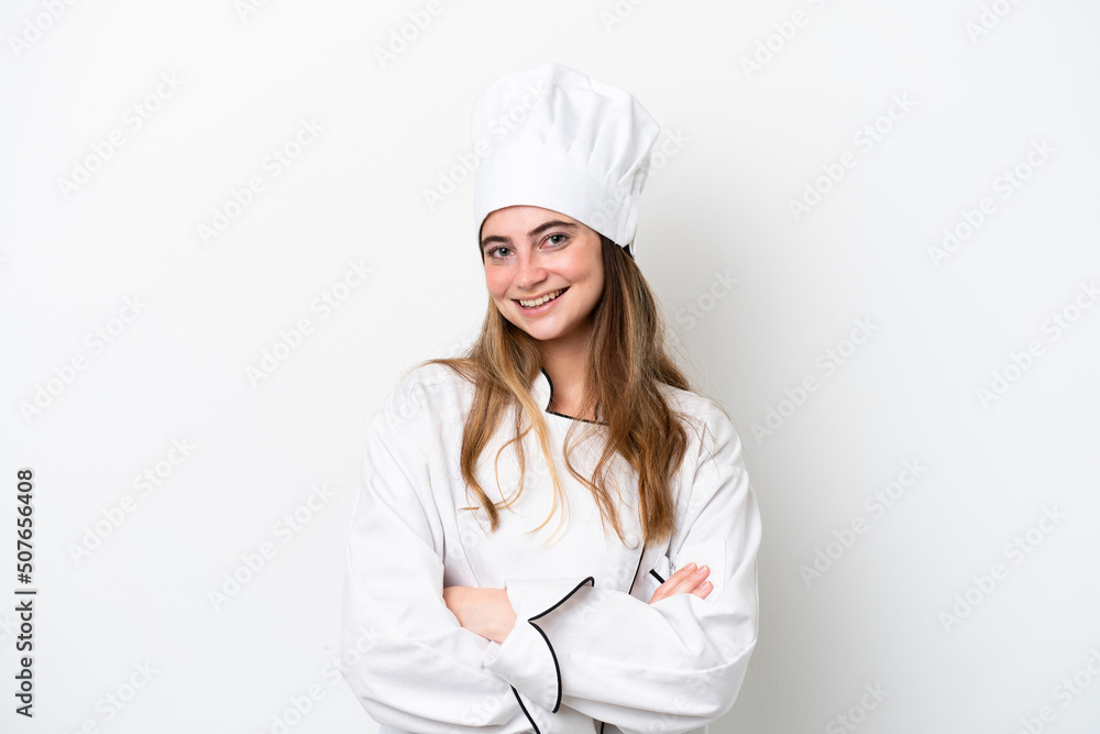 Young caucasian chef woman isolated on white background with arms crossed and looking forward Young caucasian chef woman isolated on white background with arms crossed and looking forward
