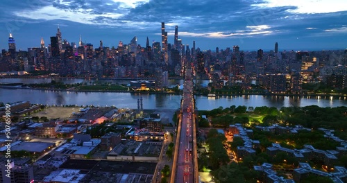 Picturesque scenery of evening New York. The 59th Street Bridge with lively traffic. Aerial view. photo