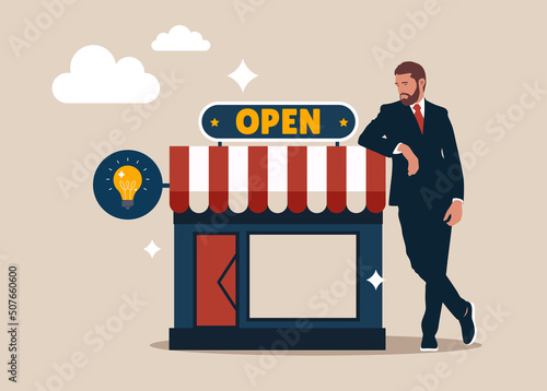 Entrepreneur standing with his new opening company or store front. Owner and entrepreneur start small business or retail shop, open store front or online shop concept.