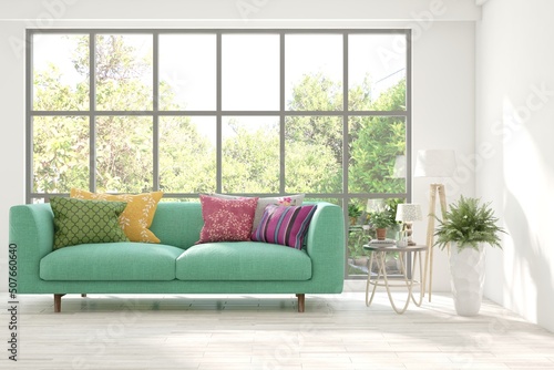 White living room with colorful sofa and summer landscape in window. 3D illustration