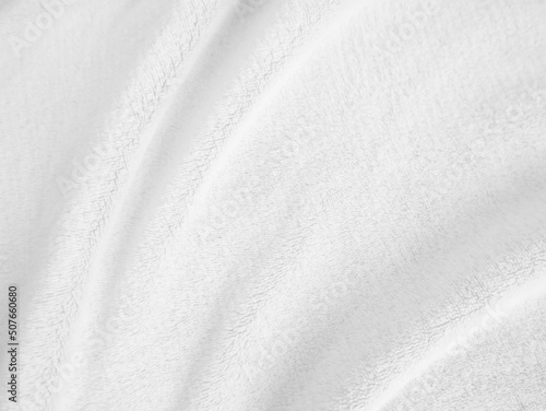 White clean wool texture background. light natural sheep wool fabric. white seamless cotton. texture of fluffy fur for designers. close-up fragment white wool carpet.