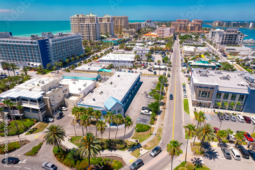 Panorama of Clearwater Beach FL. Florida Beaches. Summer vacations. Beautiful View on Hotels and Resorts on Island. Turquoise color of Ocean water. American Coast or shore Gulf of Mexico. Sunny Day