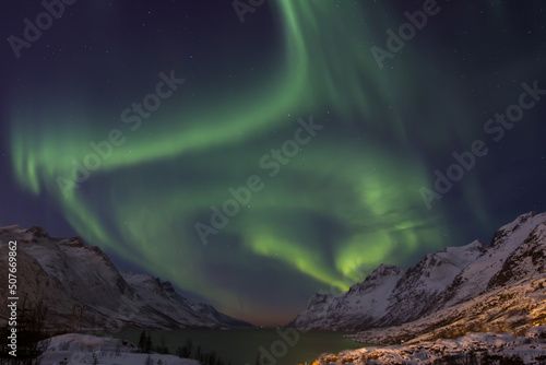 Aurora Borealis over Ersfjordbotn near Tromso in Norway