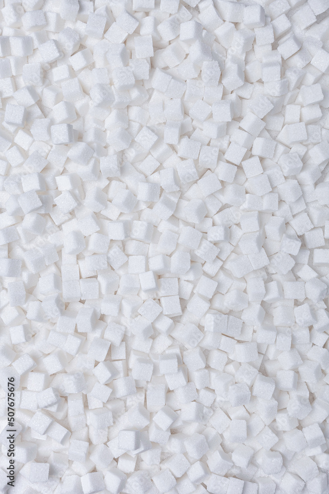 Rafinated sugar. Textured white background from sugar cubes. Rafinated sugar. Textured white background from sugar cubes.