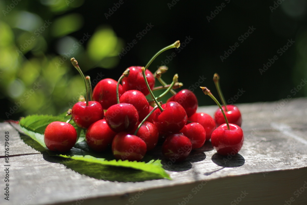 Hill of cherries at sunset. Summer dessert. Hill of cherries at sunset. Summer dessert.