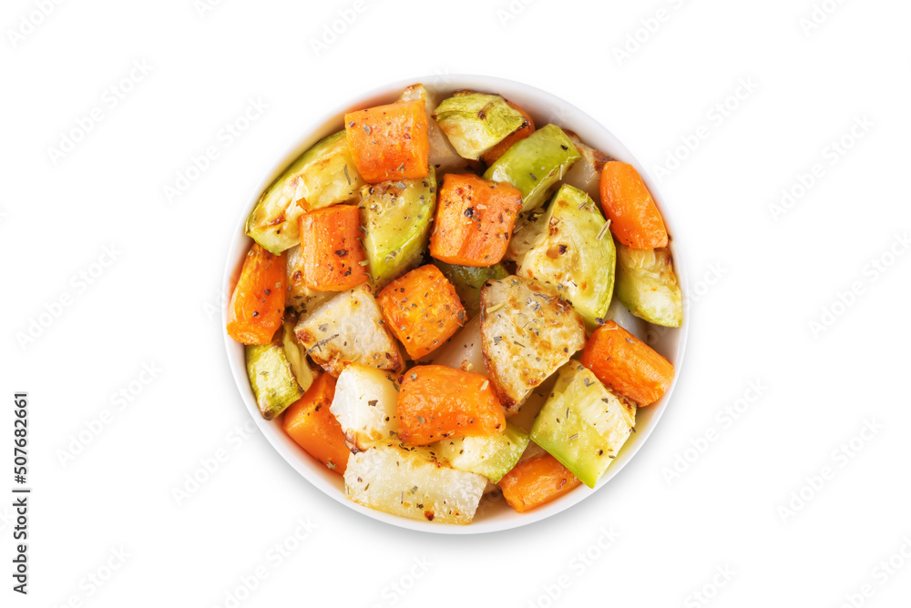 Roasted potato, carrot and zucchini bowl on a white isolated background Roasted potato, carrot and zucchini bowl on a white isolated background