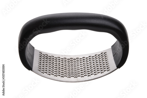 Garlic press on white background.