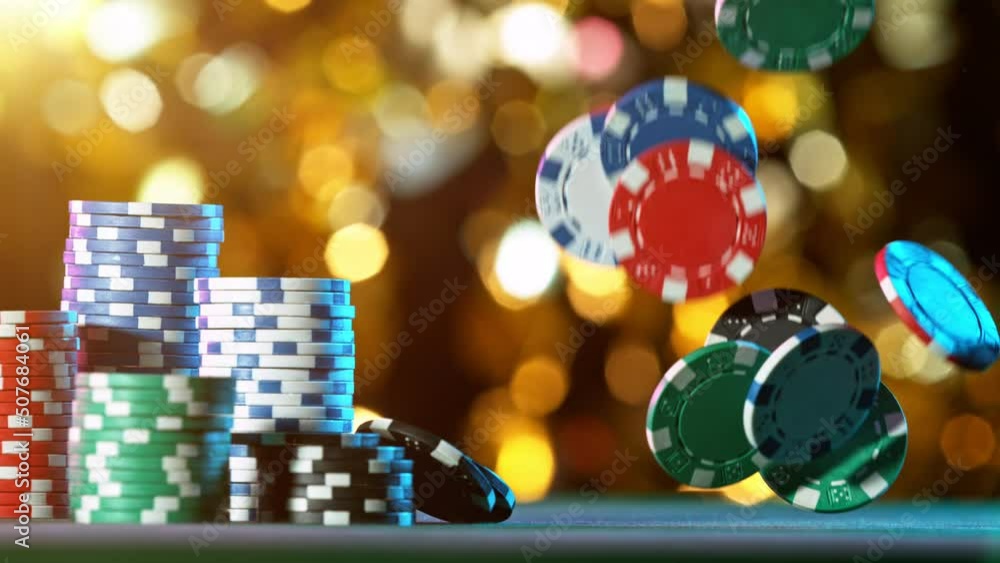 Poker chips falling on casino table in super slow motion, filmed on high speed cinema camera at 1000 fps. Gambling background. Poker chips falling on casino table in super slow motion, filmed on high speed cinema camera at 1000 fps. Gambling background.