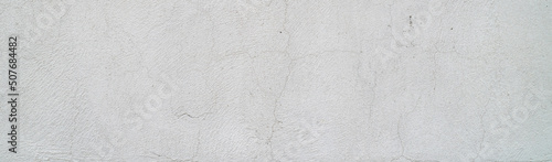 Panoramic white concrete scratched, white plaster wall surface for background