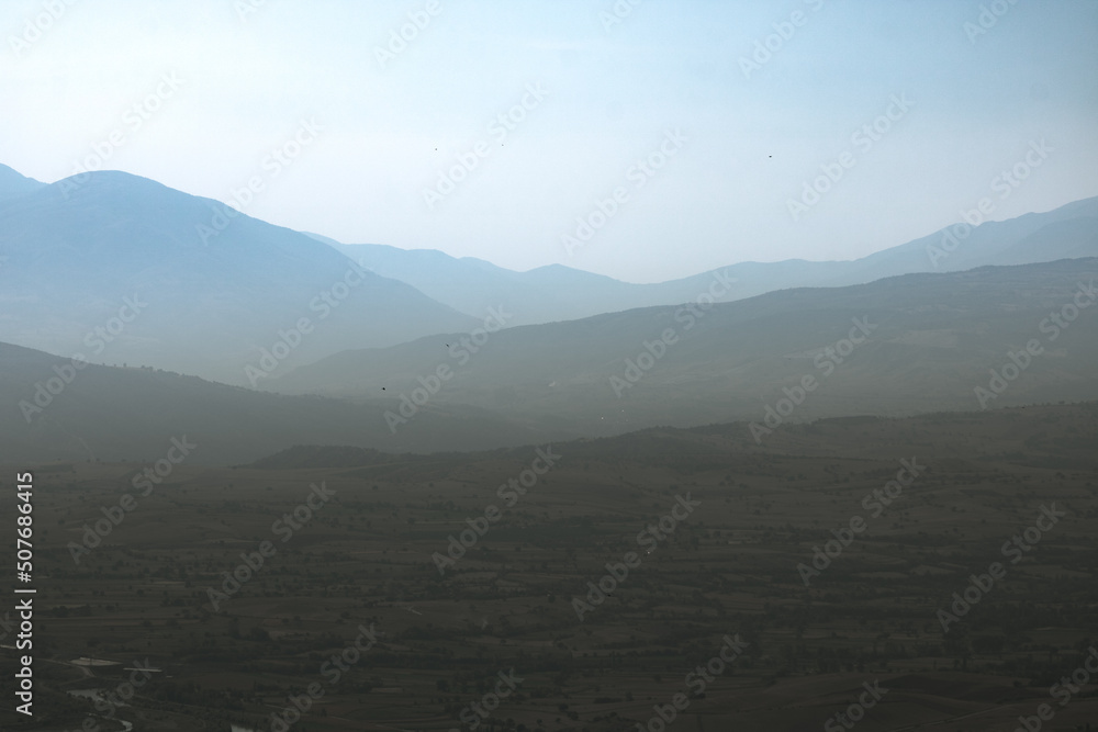 Landscape of the silhouette of the hills and plain. Nature background photo