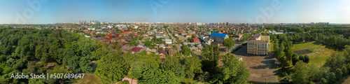 aerial panorama of the urban landscape of the city of krasnodar near the park Arboretum of KSAU on a sunny day at the end of spring