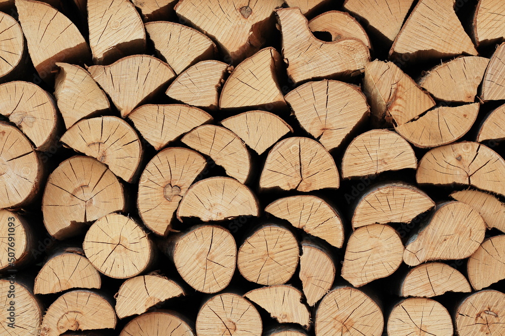 Stack of firewood, Natural texture of chopped wood, minimalistic natural wallpaper, blank background. Stack of firewood, Natural texture of chopped wood, minimalistic natural wallpaper, blank background.