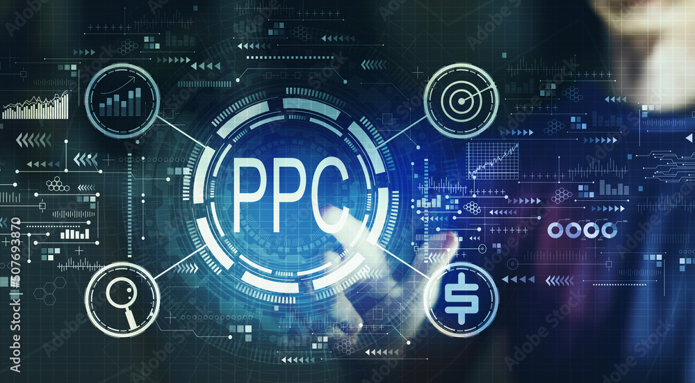PPC - Pay per click concept with young man touching a digital screen at night PPC - Pay per click concept with young man touching a digital screen at night