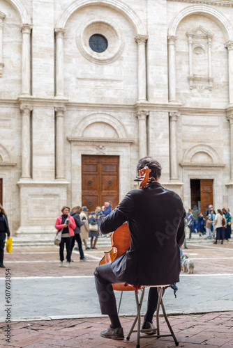 Cello player in Pienza Val D'Orcia Tuscany Italy photo