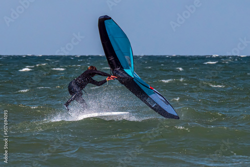 фотографія Wing Surfer overthrow into the water