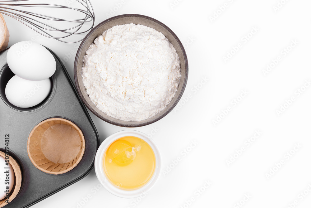 Baking ingredients on white background. Food background. Top view Baking ingredients on white background. Food background. Top view