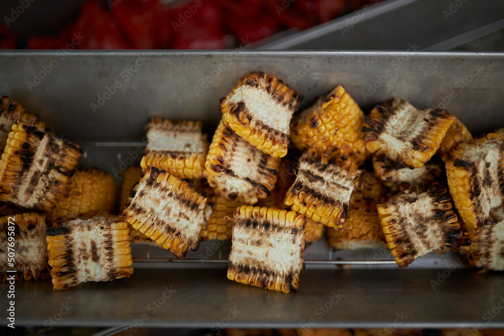 Corn cooked on the grill. Grilled vegetables Corn cooked on the grill. Grilled vegetables