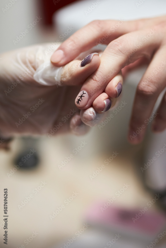 manicurist makes a manicure. The process of creating a quality manicure. Personal care. Beauty industry
manicurist makes a manicure. The process of creating a quality manicure. Personal care. Beauty industry