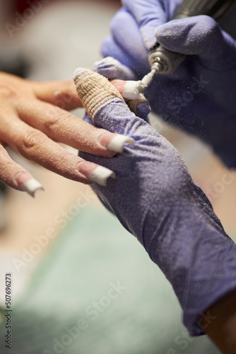 manicurist makes a manicure. The process of creating a quality manicure. Personal care. Beauty industry  