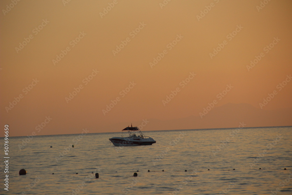 boat at sunset