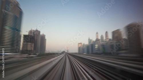 Wallpaper Mural dubai cityscape famous metro line ride sunset panorama 4k time lapse uae Torontodigital.ca