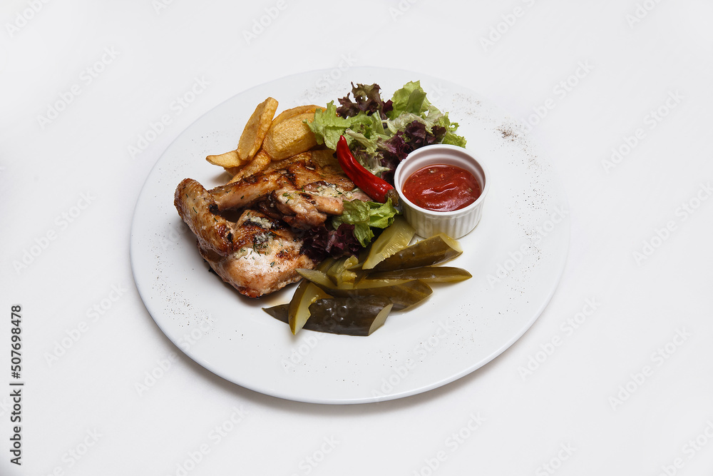 potatoes chicken meat cucumber on white background