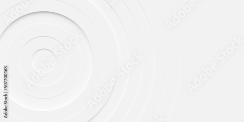 Concentric randomly offset white rings or circles steps fading out background wallpaper banner, close up flat lay top view from above photo