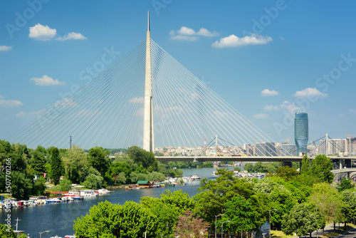 Belgrade, Serbia - May 13, 2022: The Ada Bridge is a cable-stayed bridge over the Sava river in Belgrade, Serbia.
