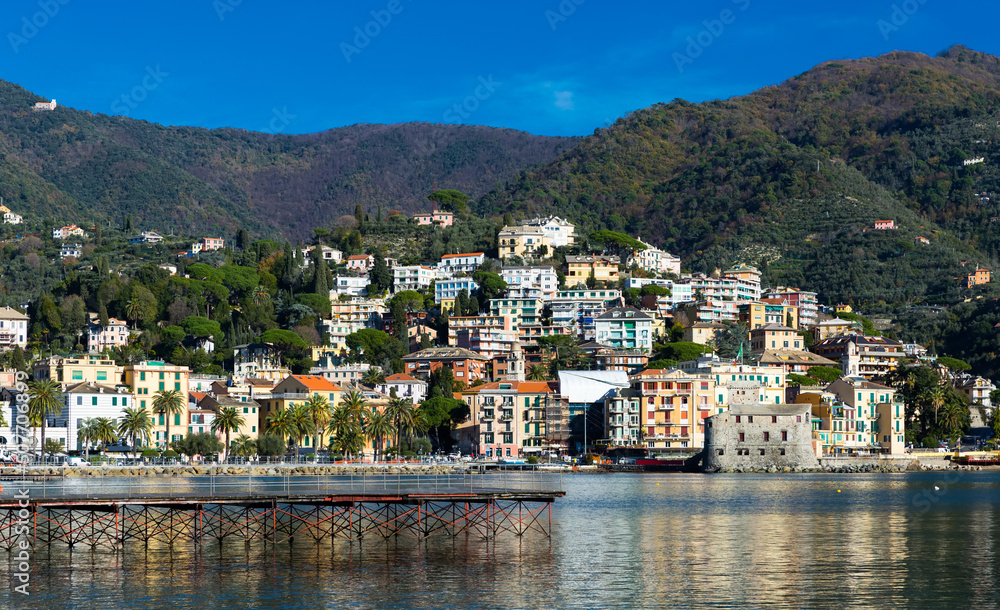 View of small scenic town of Rapallo with castle on Ligurian Sea coast of Italy