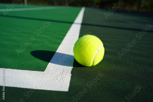 tennis ball on the court © Jennifer