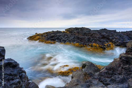 waves crashing on rocks